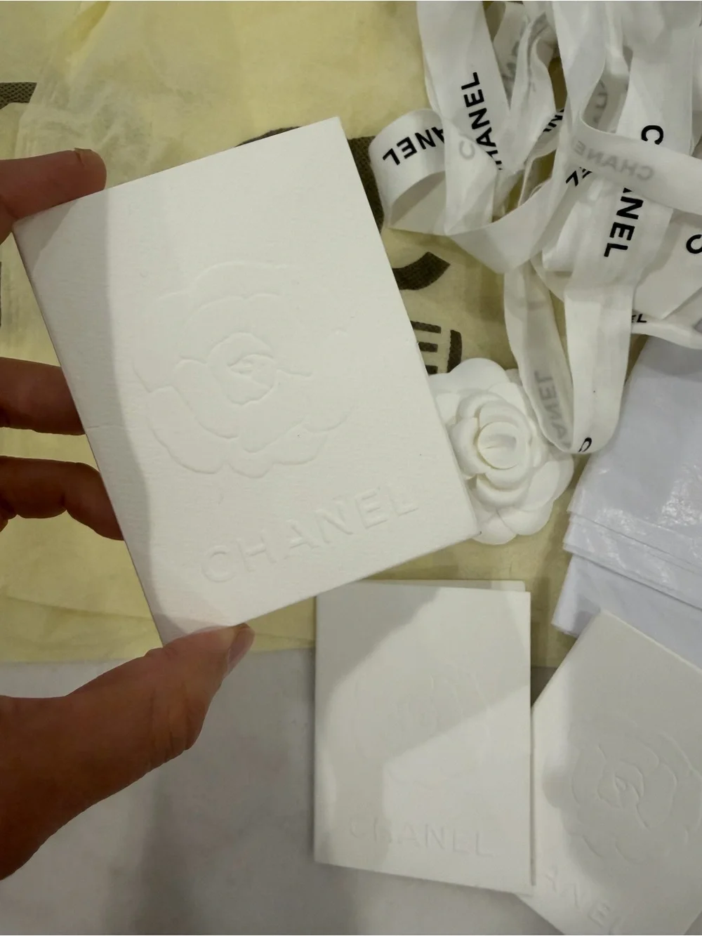 CHANEL White Embossed Camellia Card & Ribbon Gift Set